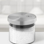 Wood table top on blur kitchen counter (room)background.