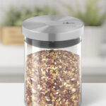 Wood table top on blur kitchen counter (room)background.